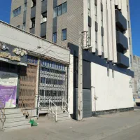 یک باب مغازه مدرس