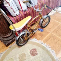 دوچرخه ۱۲ قدیمی کارکرده سالم با دو عدد چرخ کمکی