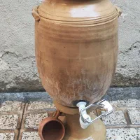 کوزه سفالی اب
