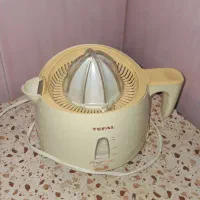 آب پرتقال گیر برقی