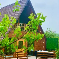 کلبه چوبی سوییسی جکوزی دار کنار رودخانه بابلکنار