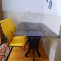 میز غذا خوری ۶ نفره شیشه ده میل پایه چوبی