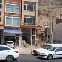 فروشی ساختمان سه طبقه هم کف تجاری دو طبقه مسکونی