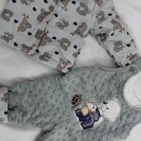 پتو و لباس نوزادی