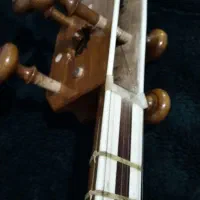 تار دو مهر بهرام|سازهای سنتی|اسلام‌شهر, سیمرغ|دیوار