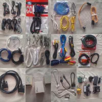 تعدادی کابل کامپیوتر و مودم و تلفن و آداپتور و ...