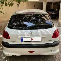 پژو ۲۰۶ سفید اسفند ۹۷ تیپ ۵|خودرو سواری و وانت|تهران, قلهک|دیوار