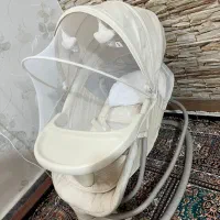 گهواره برقی و صندلی غذای کودک