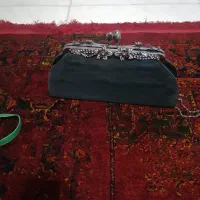 کیف مجلسی|کیف، کفش، کمربند|شیراز, میانرود|دیوار