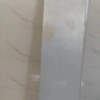 تخت چوب و قفسه