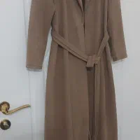 تعدادی پالتو لباس