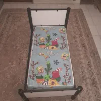 تخت کودک وتوشک