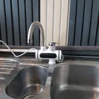 آبگرمکن برقی همراه با علم فنری