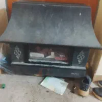 یک‌عدد‌یخچال‌12‌فوت‌وآب‌سرد‌کن‌و‌بخاری‌شومینه