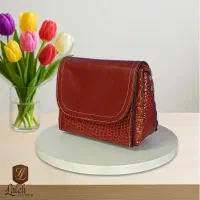 کیف چرم طبیعی به رنگ قرمز آجری