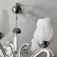 لوستر شش شاخه طلایی وچوب سفیدنو کریستال های مخروطی
