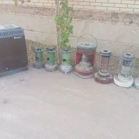 تعدادی چراغ نفتی و گازی و بخاری گازی