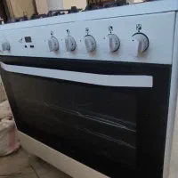 اجاق گاز فردار و میز تلویزیون