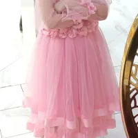 پیراهن عروس و تعدادی لباس بچگانه
