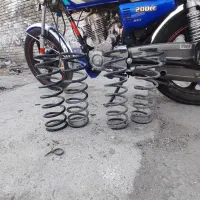 فنرلول تیبا دوگانه و تک سوز عقب باربند تیبا و|قطعات یدکی و لوازم جانبی|جوانرود, |دیوار