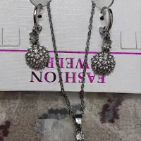 ست گوشواره وگردنبندبدل جنس خوب قیمت مناسب نقره ای