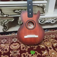 گیتار کودکانه|اسباب‌‌بازی|شاهین‌شهر, نبوت|دیوار