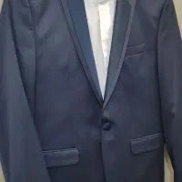 یک دست کت و شلوار و تعدادی کت تک