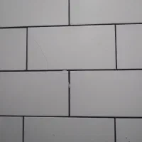 یک کارگر ملات کش نما برای عسلویه