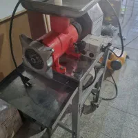 ترازو و چرخ گوشت قصابی