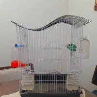 قفس پرنده . تمیز . سالم . با لوازم جانبی
