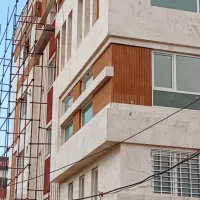 اجرای آجر نسوز و سنگ نما  و اجرای پله ساختمان