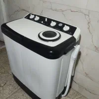 ماشین لباسشویی دوقلو کم کار تمیز درحد آک