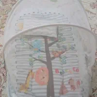 پشه بند نوزادی باتشک وبالشت وعروسک