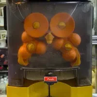 دستگاه آب پرتقال گیر