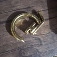 گیره  پرده طلایی رنگ