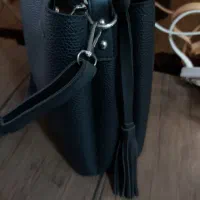 کیف مشکی|کیف، کفش، کمربند|رشت, فلسطین|دیوار