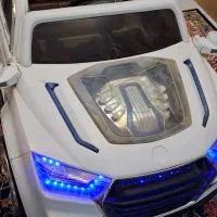 ماشین شارژی سفید در حد نو