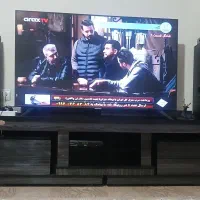 میز تلویزیون و جاکفشی وفرش کناره