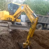 تخریب ساختمان با مینی بیل و بیل بزرگ