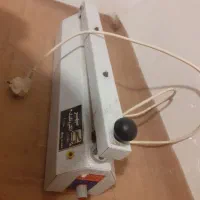 دستگاه دوخت و پرس نایلون .