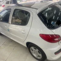 پژو 207 اتوماتیک پانوراما ارتقا یافته درب نمایندگی