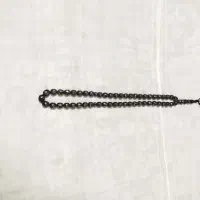 یک تسبیح زندان باف نقره و مس کوب