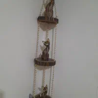 مجسمه چوبی با استند چوبی