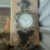 ساعت دیواری طرح چوب بسیارزیبا