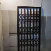 درب چوبی همراه درب آکاردئونی