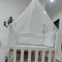 گهواره کنار تخت مادر