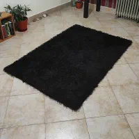 فرش ماشینی طرح خز مشکی ۱ و نیم متری (۱۰۰×۱۵۰)