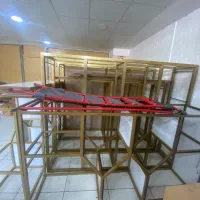 استندفروشگاهی طلایی استندویترینی قفسه و دکور مغازه