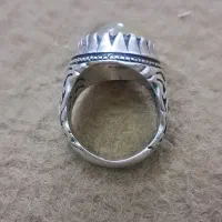 تعدادی  مهره قدیمی ،ویک عدد انگشتر، باباقوری،دوچشم