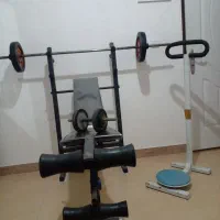 میز پرس هالتر۲۰کیلو وزنه دمبل ودستگاه مسگری یکجا